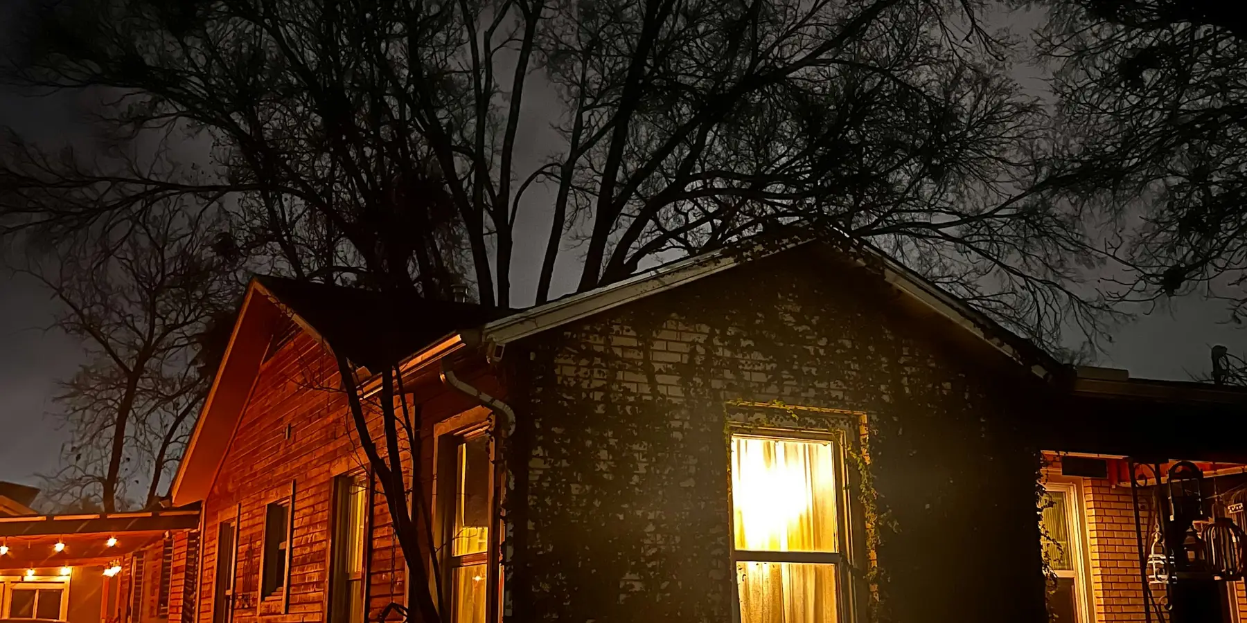 A house lit up after dark