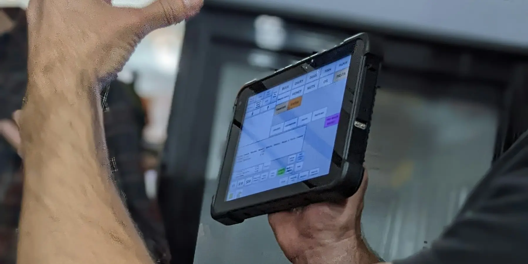 A rugged tablet being used in the field
